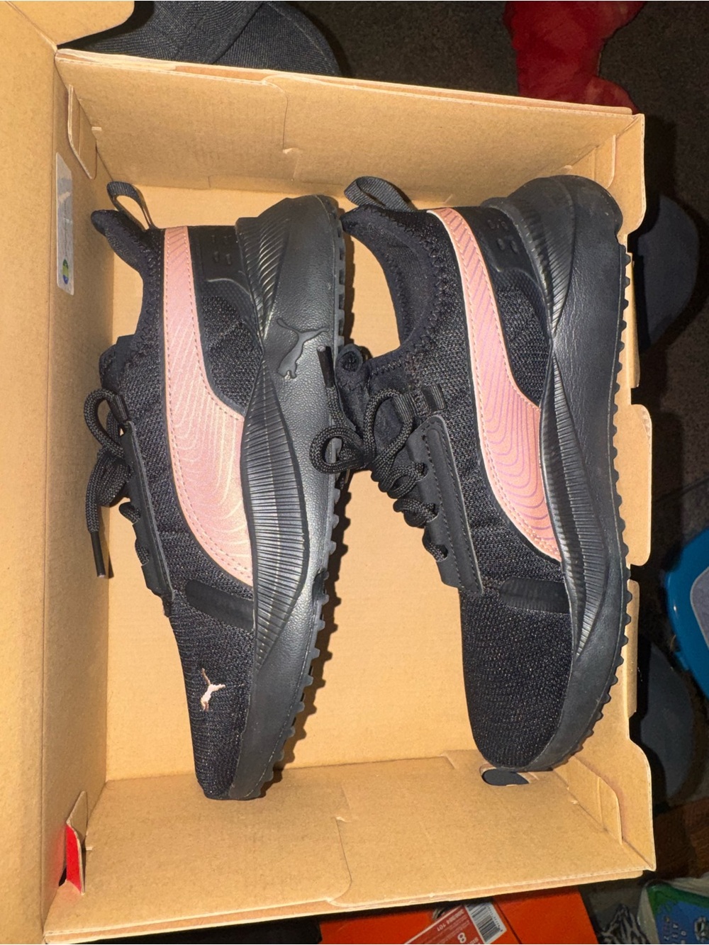 Puma women’s Black and Pink Athletic Sneakers